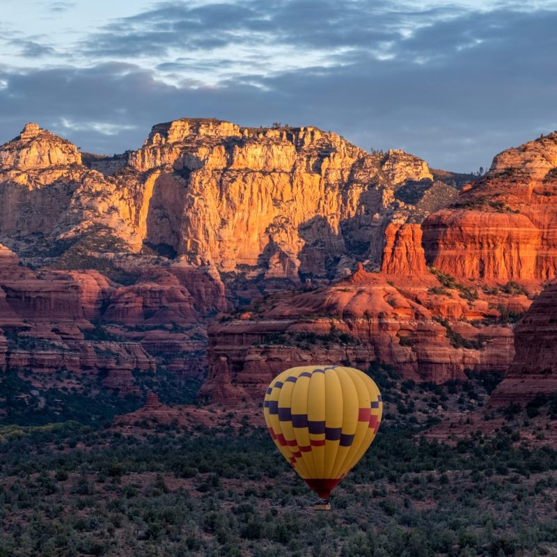 a canyon with a mountain in the background